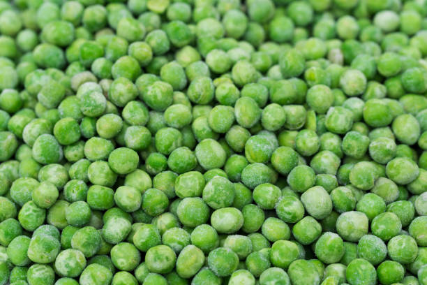istock group of frozen green peas selective focus 1472727756