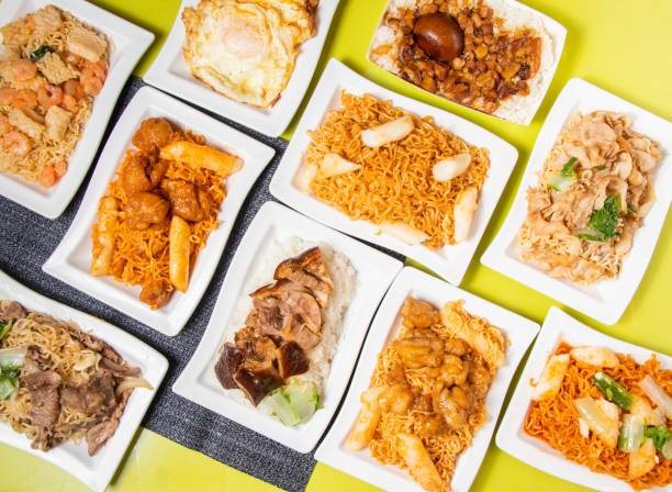 istock Assorted Stir-fried Instant Noodles with pork, beef, shrimp, Korean Cheese Fried Chicken, Braised Rice with Pork and Soy Sauce, pilaf and polao served in bowl isolated on table top view of taiwan food 1472728366