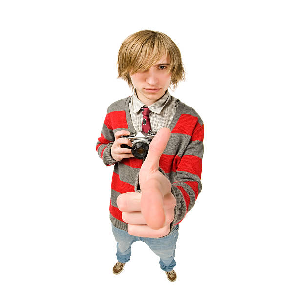 Funny fisheye shoot of young man with camera stock photo