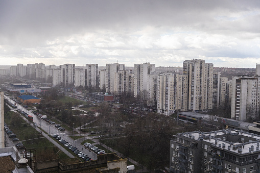 New Belgrade - Novi Beograd, Serbia, residential area, post modern socialism brutalism architecture on rainy snowy day