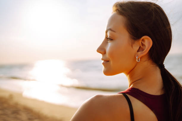 istock Young woman doing exercises outdoors in the morning 1472738762