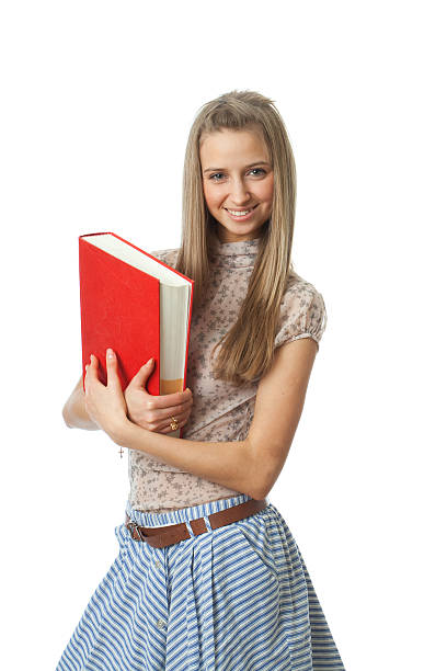 La joven estudiante con libro - foto de stock