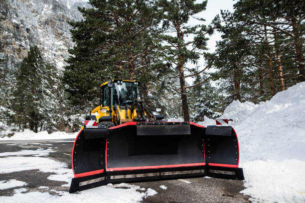 istock Snow plow ready to intervene on mountain roads 1472740291