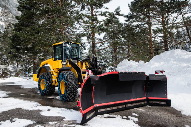 istock Snow plow ready to intervene on mountain roads 1472740294