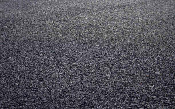 istock New asphalt road background with selective focus 1472741084
