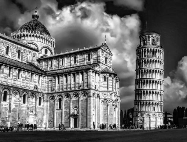 Black and white picture of leaning tower and Pisa's cathedral - Italy