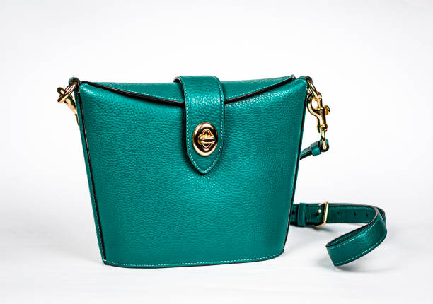 istock Green leather branded women's bag with a long strap 1472747177