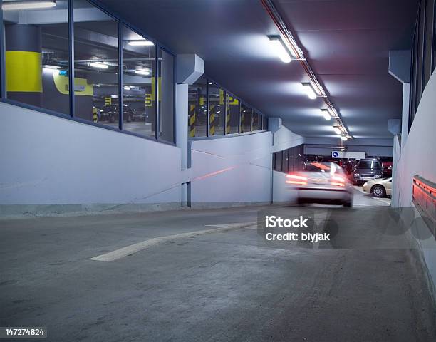 Driving Cars In Underground Parking Garage Stock Photo - Download Image Now - Parking Lot, Parking Garage, Auto Repair Shop