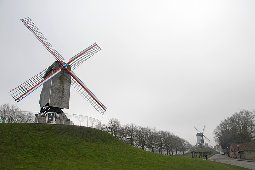 Brugge or Bruges, West Flanders, Belgium: Windmills on Kruisvest, a park on the edge of the historic old city of Brugge. Kruisvest Windmills, Bruges.