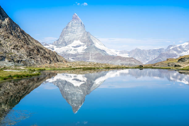 istock Matterhorn reflection in Riffelsee, Zermatt, Switzerland 1472748565
