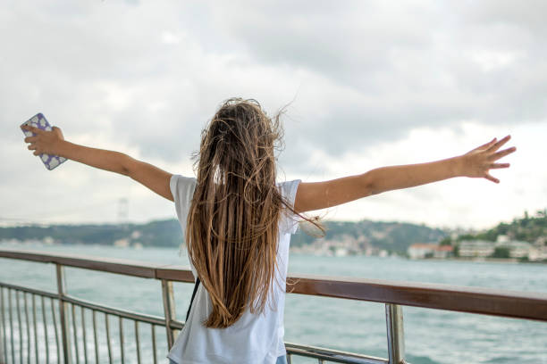 istock Beautiful girl travelling with boat 1472756846