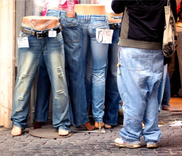 Close-Up Of Flowers On Back Pocket Of Jeans