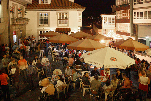 Betanzos, Spain_August 17, 2008: Galerías, sidewalk cafes in town square in Betanzos, A Coruña province, Galicia, Spain. Celebration event.