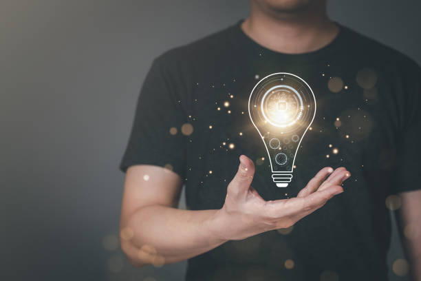 istock Male hand holding light bulb for AI Technology concept with innovation and technology inspiration, innovation in science and research concept start up, Innovation. Internet of Things. 1472762515