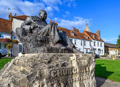 A statue of Sir Winston Churchill on The Green in Westerham, Kent, UK. Churchill was a former British prime minister who lived locally at Chartwell.