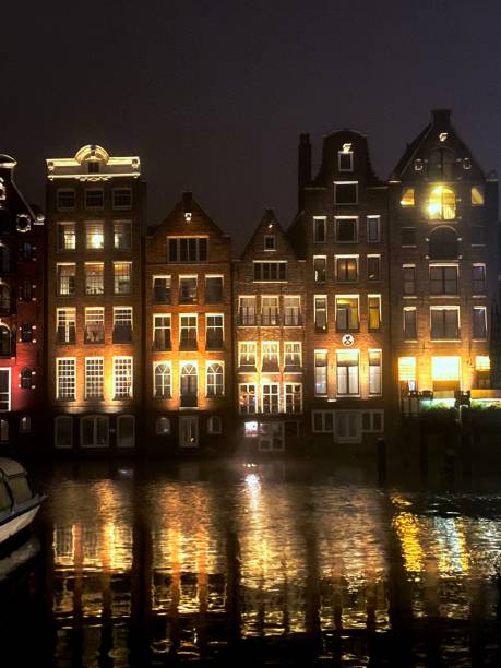 istock Gingerbread houses by night in Amsterdam 1472762759