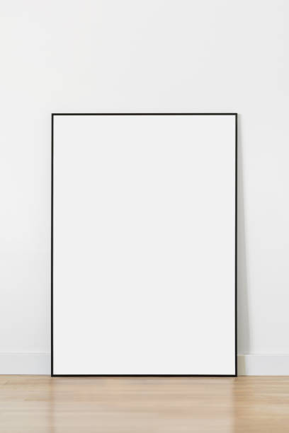 istock Artwork mockup in interior design. Blank picture frame on a wall. Vertical orientation 1472764002