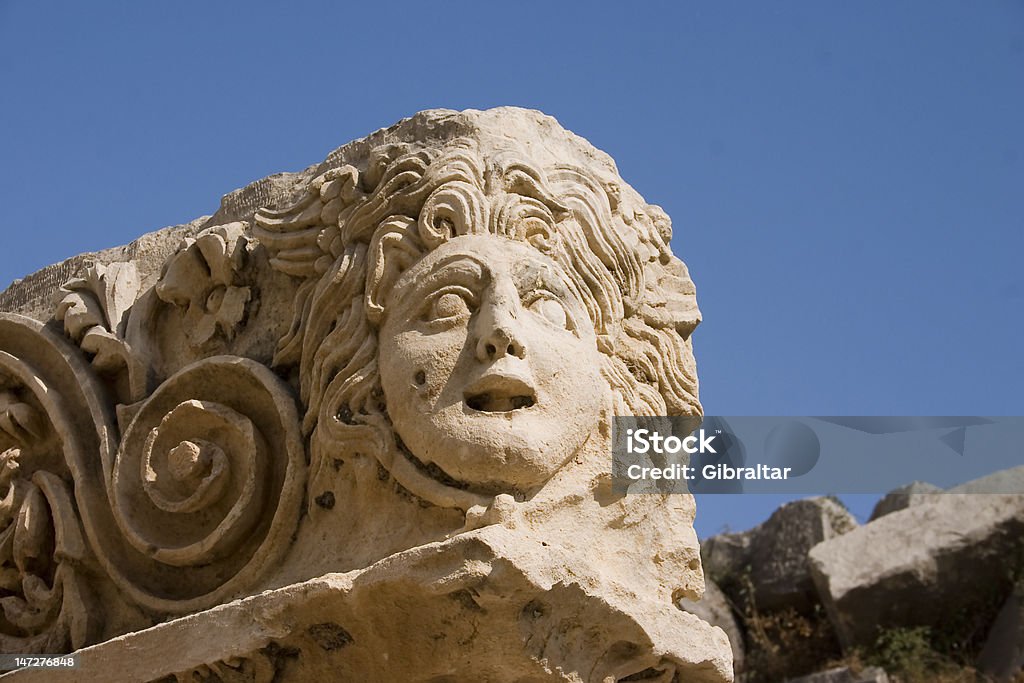 Mask of tragedy Mask of tragedy in ancient theatre in Mirra, Turkey Acropolis - Athens Stock Photo