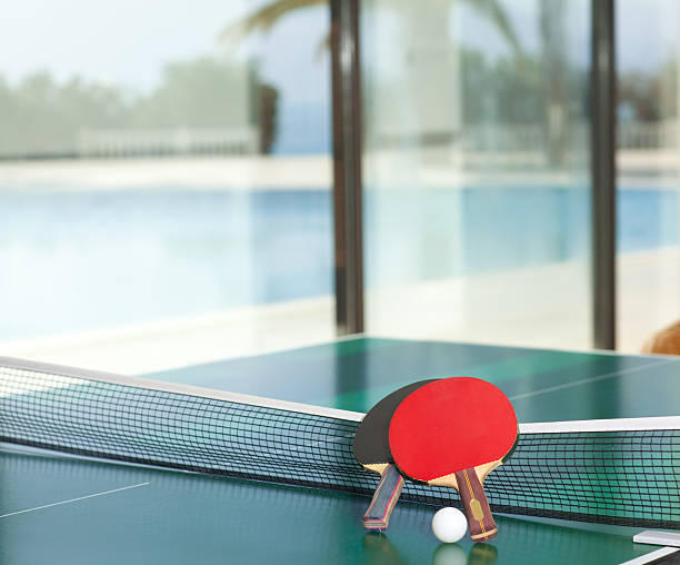 Table tennis rackets and ball stock photo