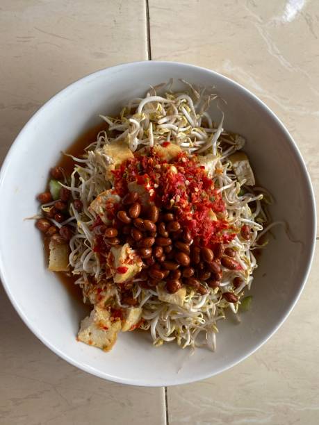 istock Petis Asinan or salad made from cucumber, bean sprouts, peanuts, 1472772138