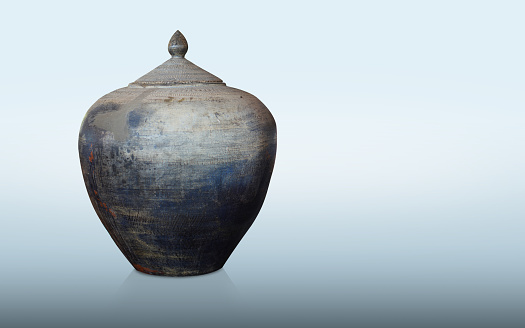 antique and old blue and black clay pot and lid on blue background, vintage, object, decor, copy space
