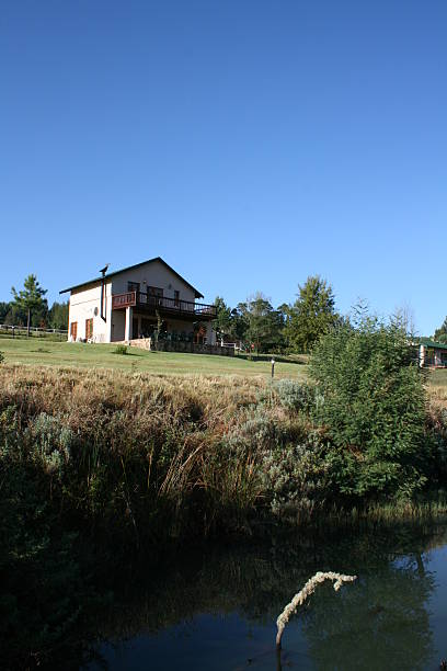 istock Cottage at the Lake 147277449