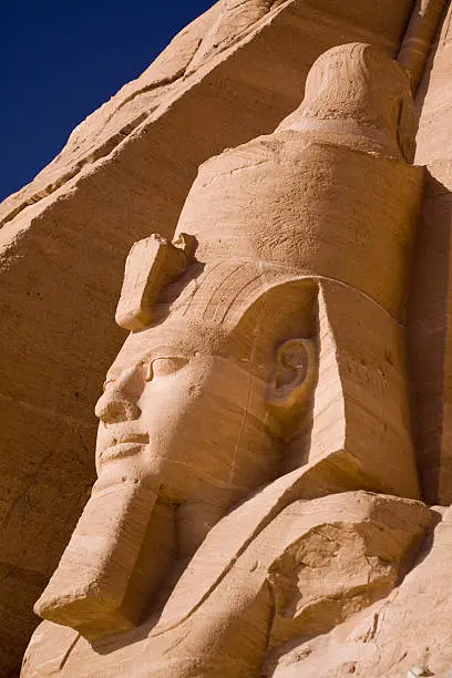 The head of a stone statue from the temple of Ramses at Abu-Simbel in Egypt