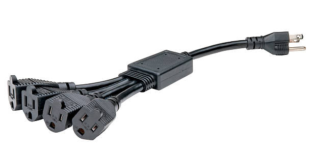 A black electrical extension cord with four (4) entries (with clipping path)