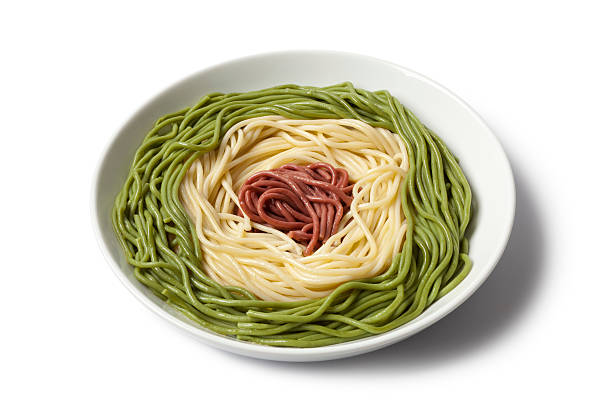 Dish with cooked Spaghetti tricolore