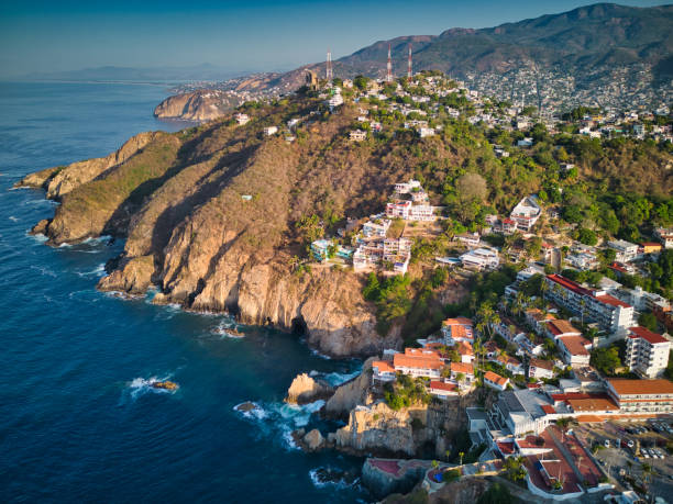 istock Cliffs in Acapulco drone aerial view 1472789476