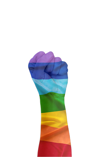 Fist up with rainbow flag painted on it