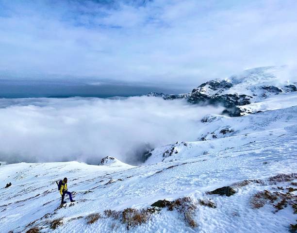 istock Climbing up the mountain 1472793400