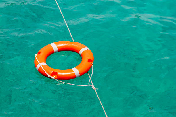 istock Rescue Swimming Float On Blue Sea 1472794226