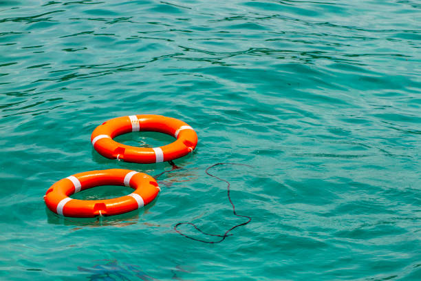 istock Rescue Swimming Float On Blue Sea 1472794238