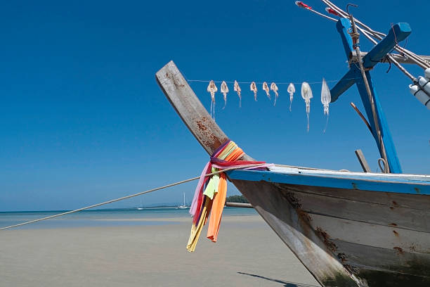 traditional thai fishermen boat stock photo