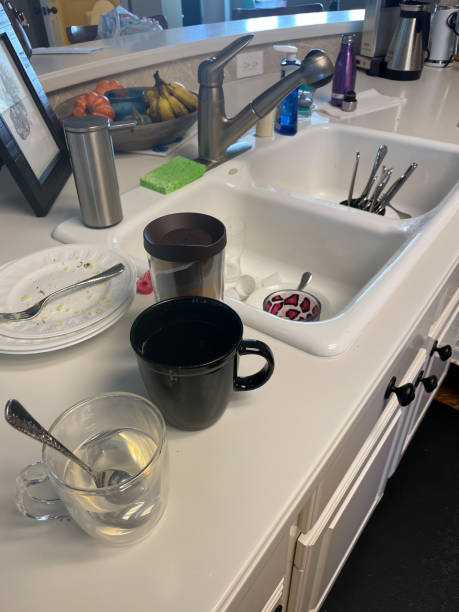 istock Kitchen Sink as Dishes Pile Up 1472797232