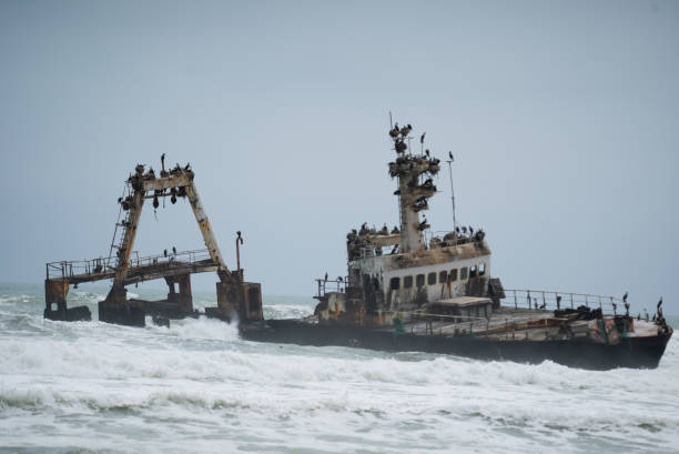 istock Sunken trawler, shipwreck. Old rusty metal ship Zeila at Skeleton Coast Namibia. 1472798740