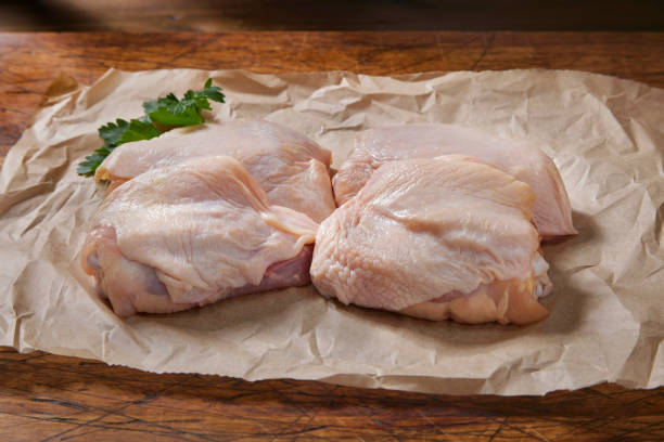 istock Raw Organic Chicken Thigh's 1472798845