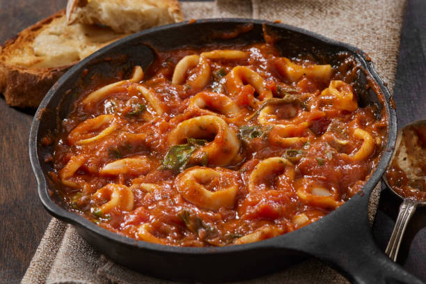 istock Italian Style Calamari in Tomato Sauce 1472798989
