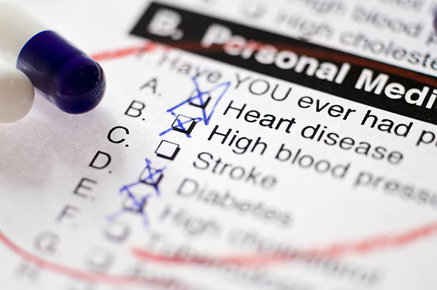 A medical form and capsules close up stock photo