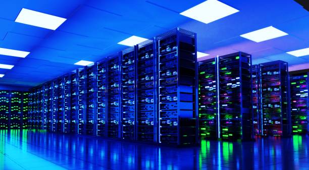 istock Big modern server room, data centre or mining farm interior with racks and neon computer lights. 3D rendering illustration 1472801486