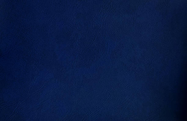 istock artificial leather texture. close up blue or navy leather texture used as background for design. abstract vintage background template. genuine leather upolstery for cloth wearing. 1472802633