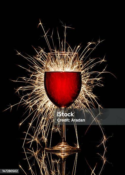 Glowing Red Wine And Firework Stock Photo - Download Image Now - No People, Photography, Vertical