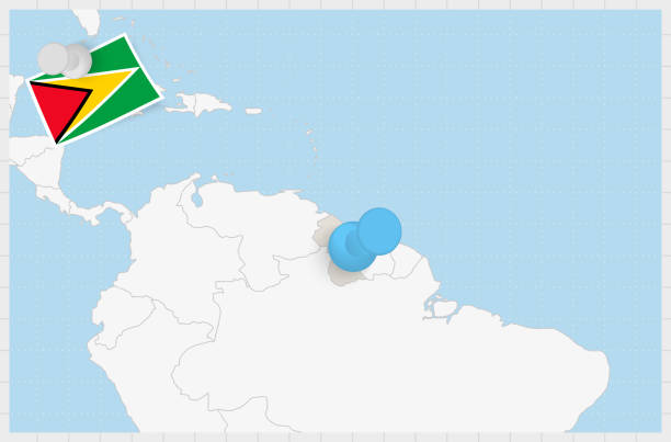 istock Map of Guyana with a pinned blue pin. Pinned flag of Guyana. 1472805763