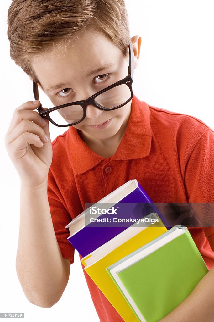 Niño en edad escolar con libros - Foto de stock de Adolescencia libre de derechos