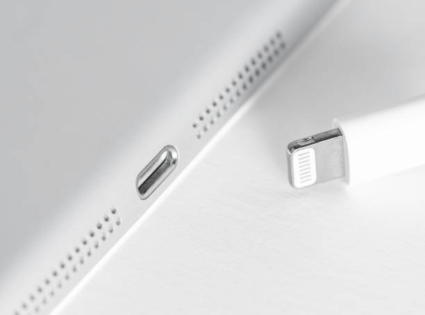 istock Apple Lightning Connection port on iPad. Connection used to connect mobile devices such as iPhones, iPads or iPods to computers. 1472811825