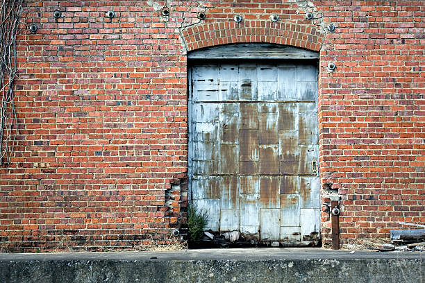 istock Old rusted door to an abandoned building 147281278