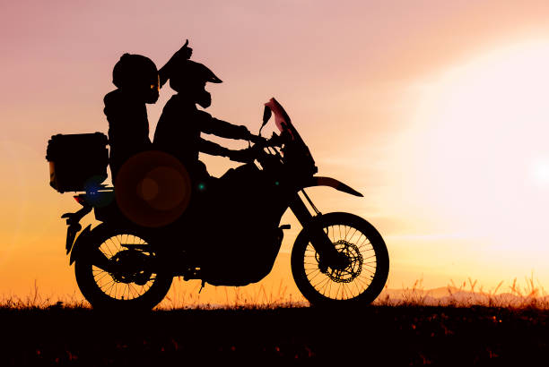 istock Journeys of couples making trips with motorcycles 1472816576