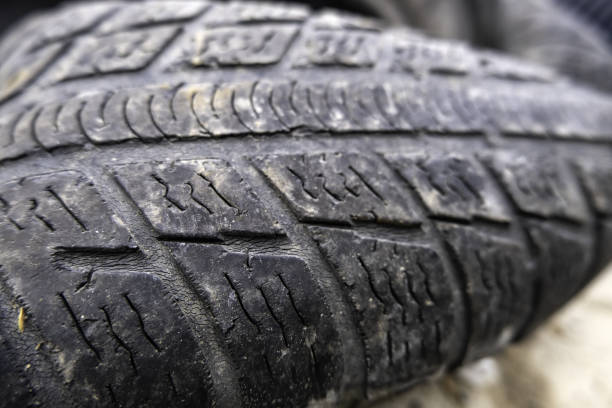 istock Tires in the trash 1472816833