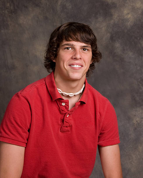 School portrait pose with teenage male A teenage, male high school senior in a classic school portrait pose. school picture stock pictures, royalty-free photos & images